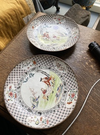 A pair of Chinese Canton enamel 'foreigner' plates, Qianlong