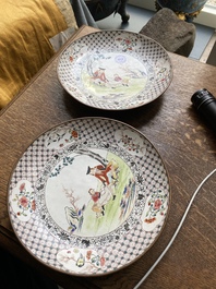 A pair of Chinese Canton enamel 'foreigner' plates, Qianlong