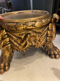 A Chinese yellow-ground famille verte 'dragons' fish bowl on gilded wooden stand, 19th C.