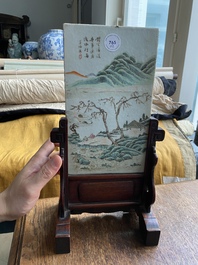 A Chinese famille rose dish and a qianjiang cai plaque signed Wang Ziqing mounted as a screen, Yongzheng and Republic