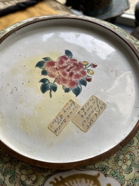 A pair of Chinese Canton enamel 'foreigner' plates, Qianlong