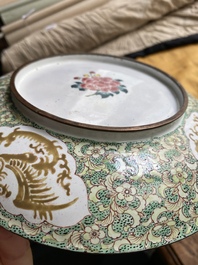 A pair of Chinese Canton enamel 'foreigner' plates, Qianlong