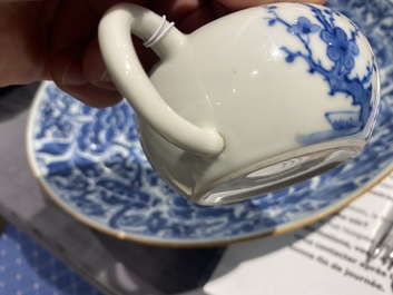 A small Chinese blue and white teapot with floral design, 19th C.