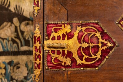 A Spanish walnut 'bargue&ntilde;o' cabinet with red velvet and bronze mounts, 17th C.