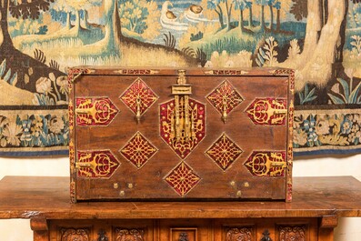 A Spanish walnut 'bargue&ntilde;o' cabinet with red velvet and bronze mounts, 17th C.