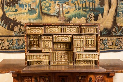 A Spanish walnut 'bargue&ntilde;o' cabinet with red velvet and bronze mounts, 17th C.