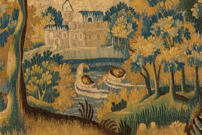 A Flemish wall tapestry with a forest view with a castle, 17th C.