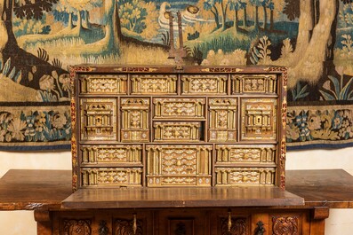A Spanish walnut 'bargue&ntilde;o' cabinet with red velvet and bronze mounts, 17th C.