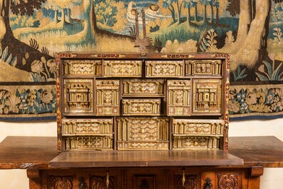 A Spanish walnut 'bargue&ntilde;o' cabinet with red velvet and bronze mounts, 17th C.
