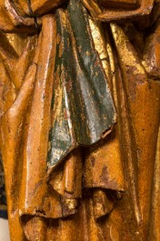 Two large Flemish polychromed and gilt walnut figures of Mary and John the Baptist, Brabant, late 15th C.