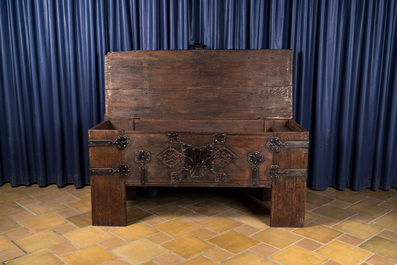 A large German rectangular wooden 'Stollentruhe' chest with iron and brass mounts, Westphalia, 17th C.