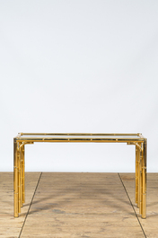 A brass Hollywood Regency-style console with matching mirror, Italy, 20th C.
