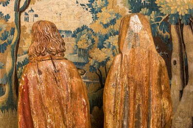 Two large Flemish polychromed and gilt walnut figures of Mary and John the Baptist, Brabant, late 15th C.