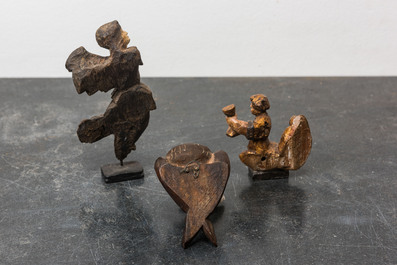 Three small wooden sculptures of putti, 16/17th C.