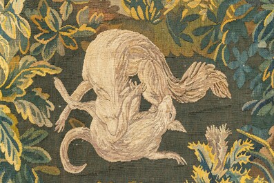 A French Aubusson wall tapestry with a wolf battling a fox in a forest setting with castle view, 19th C.