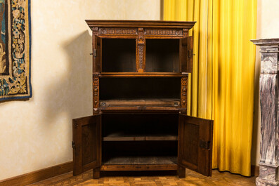 A Flemish oak five-door cupboard, 17th C.