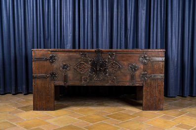 A large German rectangular wooden 'Stollentruhe' chest with iron and brass mounts, Westphalia, 17th C.