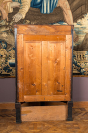 A gilt copper-mounted ebonised demi-lune bar cabinet with mirror back, 19th C.