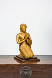 A Thai gilt-lacquered bronze figure of a praying Buddha, 1st half 20th C.