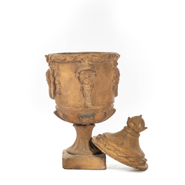 A large terracotta urn and cover with Roman busts and soldier heads, France or Italy, 18/19th C.