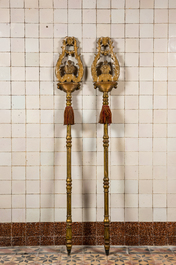 A pair of gilt wooden procession crucifixes depicting the saints Luke and Mark, 18th C.