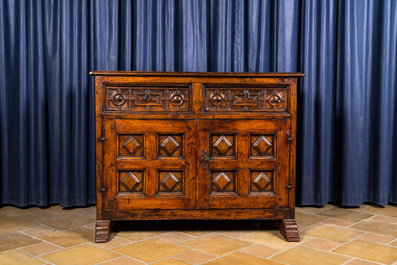 A Spanish walnut dresser with two doors and two drawers, 17th C.