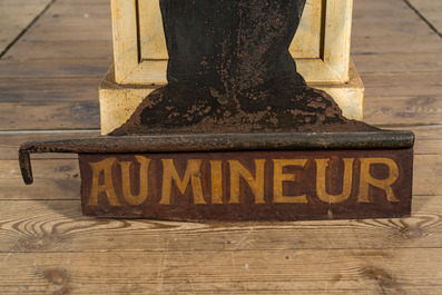 A painted iron hanging sign for a bar titled 'Le Mineur' (the mineworker), 19/20th C.
