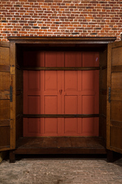 A Flemish Gothic oak two-door cabinet with linenfold panels, 19th C. with older elements