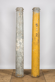 Two grey- and yellow-painted industrial wooden columns, 19/20th C.