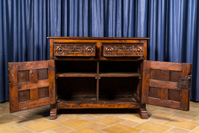 A Spanish walnut dresser with two doors and two drawers, 17th C.