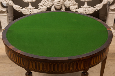 An Italian marquetry demi-lune gaming table with inlaid design of bow and arrows, 18/19th C.