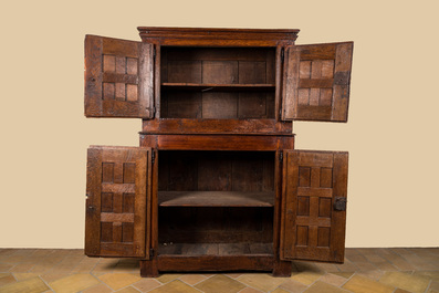A Spanish wooden four-door cupboard with cast iron locks and hinges, 17th C.