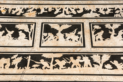 An Italian black and white scagliola table with hunting scenes, probably 18th C.