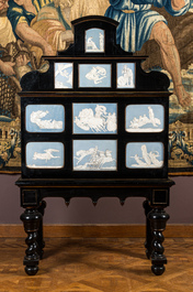 A most probably Greek ebonised wooden cabinet on foot with Wedgwood-style gods' and goddesses' plaques, 19/20th C.