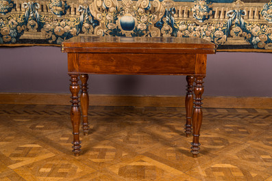 A wooden gaming table with red inner lining, 19th C.