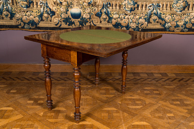 A wooden gaming table with red inner lining, 19th C.