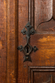 A Flemish Gothic oak two-door cabinet with linenfold panels, 19th C. with older elements