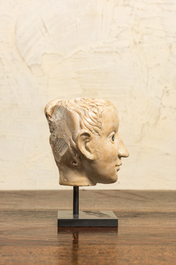 An Italian marble head in Roman-style with coins inlaid as eyes, probably 17th C.