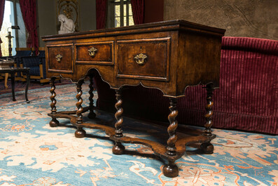 An English walnut sideboard with three drawers, 19th C.