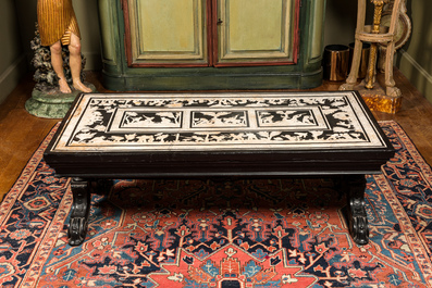 An Italian black and white scagliola table with hunting scenes, probably 18th C.