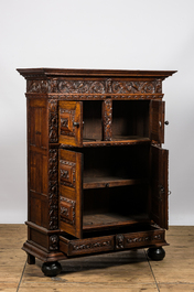 A finely sculpted Flemish oak four-door cabinet, late 17th C.