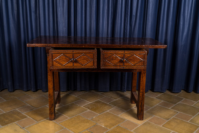 A Spanish walnut table with two drawers, 17th C.