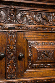 A finely sculpted Flemish oak four-door cabinet, late 17th C.