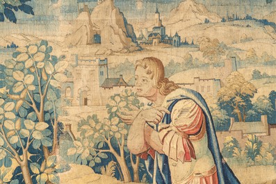 A Flemish wall tapestry with a kneeling apostle, 17th C.