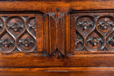 A wooden Gothic Revival buffet with older elements and wrought iron mounts, 19th C.