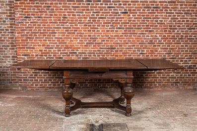 A Dutch extendable wooden table, 17th C.