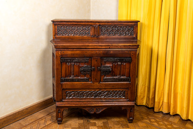 A wooden Gothic Revival buffet with older elements and wrought iron mounts, 19th C.