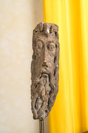 A carved stone head of God the Father, probably 16th C.