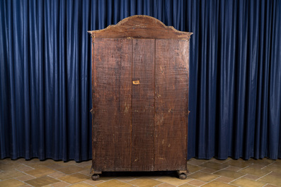 A colonial wooden display cabinet with four doors and two drawers at the inside, ca. 1800