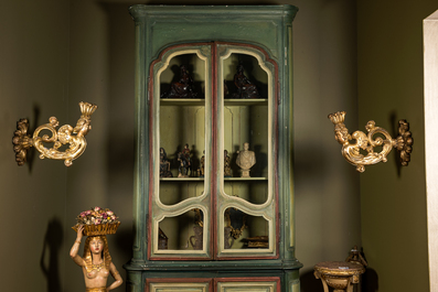 A pair of gilt wooden wall appliques with crowned cherubs, 18th C.